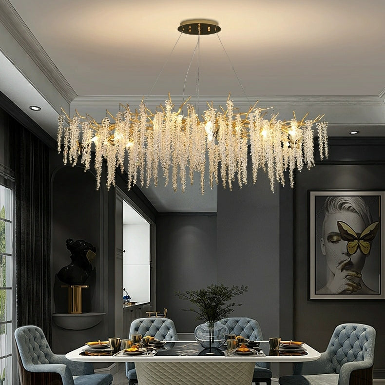 https://cdn.shopify.com/s/files/1/0554/8562/8591/products/CheapCrystalLeafChandelierForDiningTableBranchStyleCeiling.jpg?v=1714378607