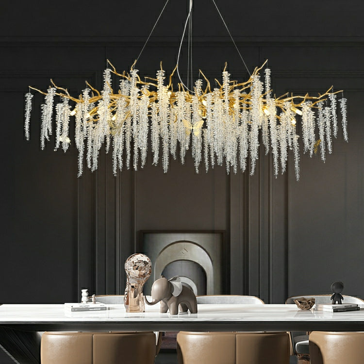 https://cdn.shopify.com/s/files/1/0554/8562/8591/products/CheapCrystalLeafChandelierForDiningTableBranchStyleCeilingLightforModernHome.jpg?v=1714378607