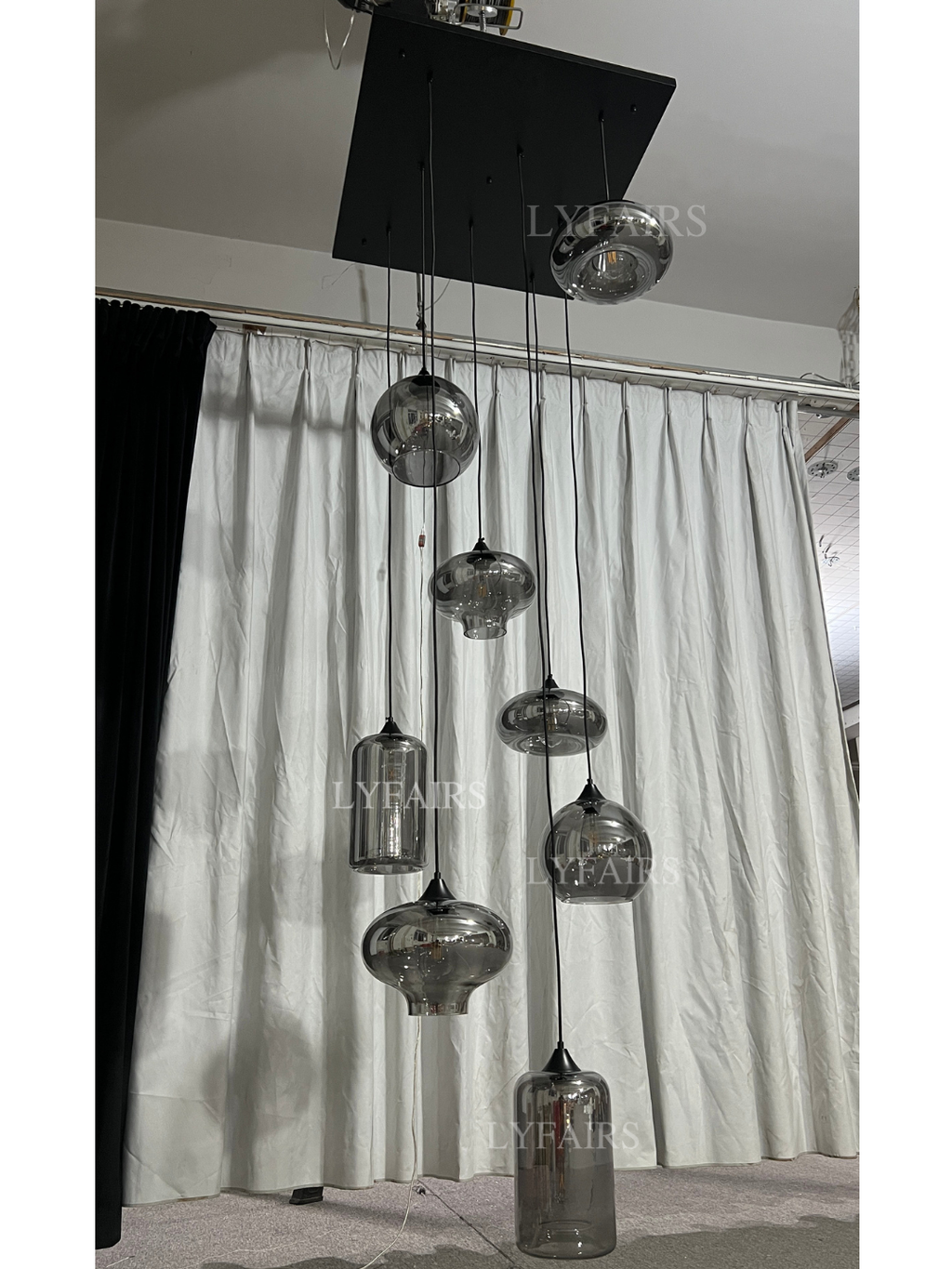 https://cdn.shopify.com/s/files/1/0554/8562/8591/files/LYFAIRSModernSmokeGrayGlassPendantLightFixtureChandelier_1.png?v=1766650593