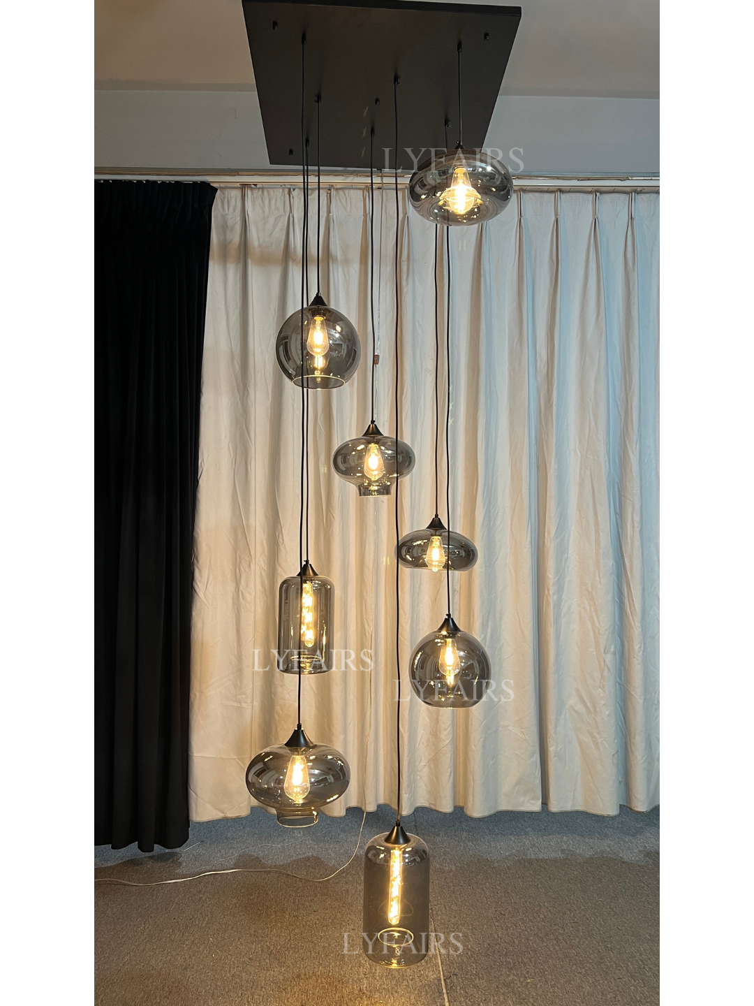 https://cdn.shopify.com/s/files/1/0554/8562/8591/files/LYFAIRSModernSmokeGrayGlassPendantLightFixtureChandelier_2.png?v=1766650593