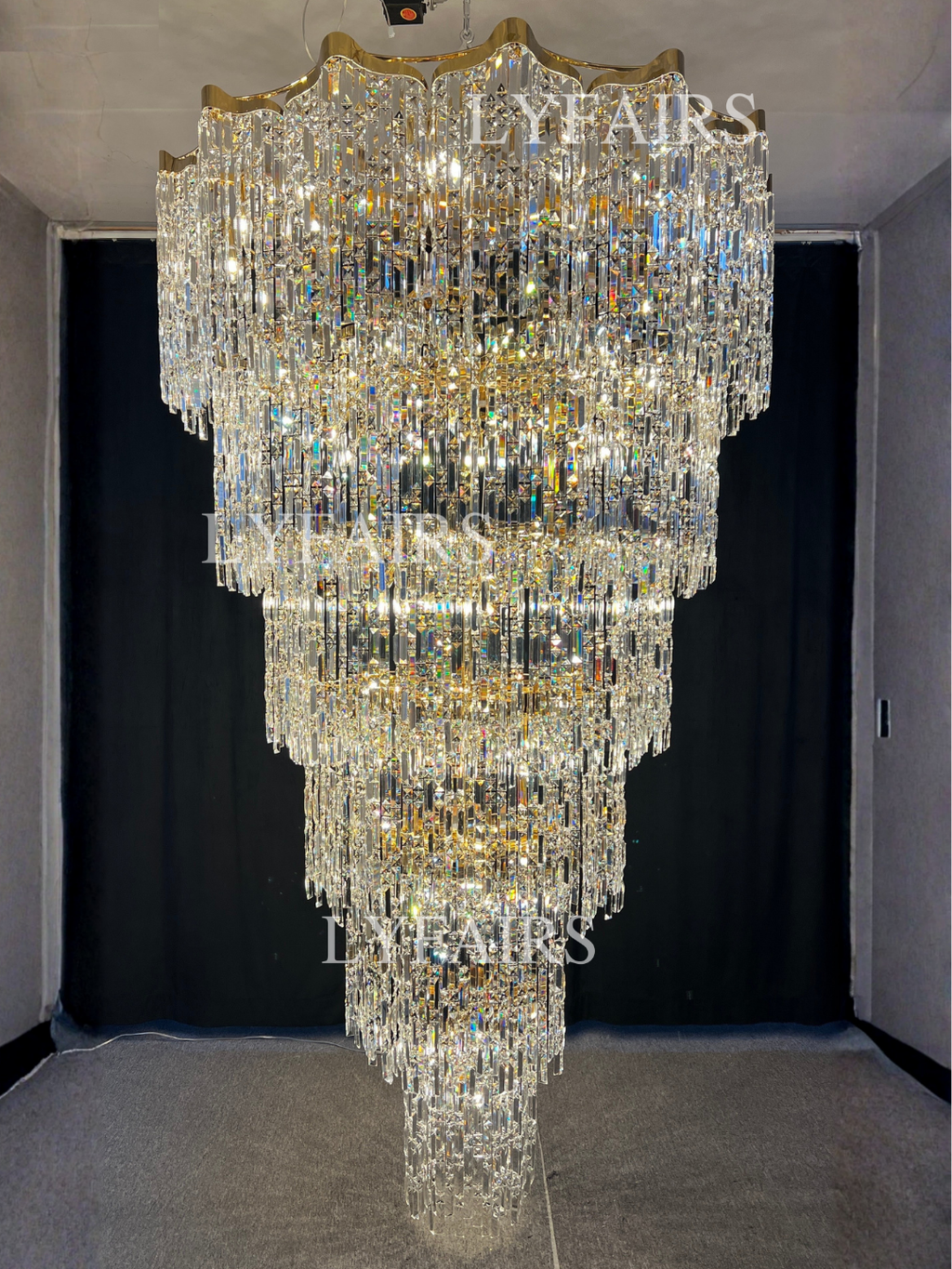 https://cdn.shopify.com/s/files/1/0554/8562/8591/files/LYFAIRSOversizedEuropeanMulti-layersGoldenLuxuryCrystalChandelierVillaHigh-ceilingFoyer.png?v=1775719722