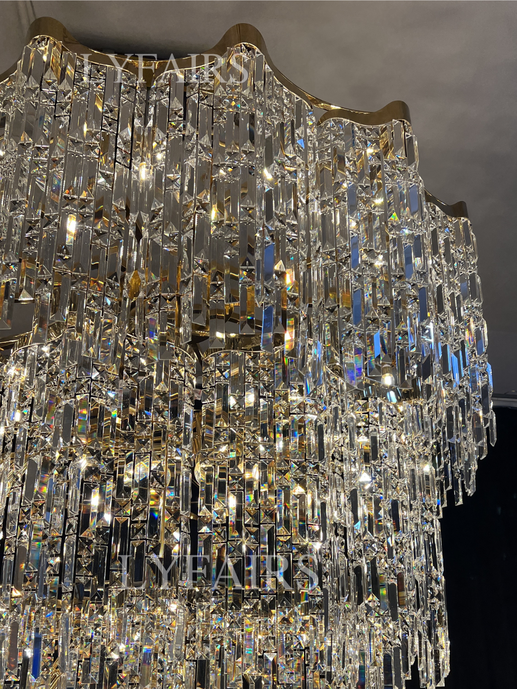 https://cdn.shopify.com/s/files/1/0554/8562/8591/files/LYFAIRSOversizedEuropeanMulti-layersGoldenLuxuryCrystalChandelierVillaHigh-ceilingFoyer_6.png?v=1775719722
