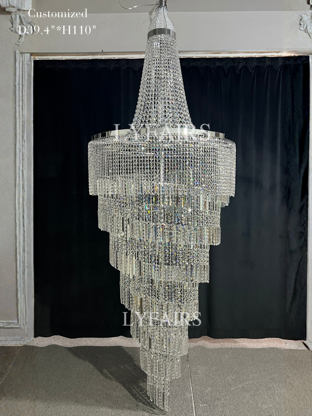 https://cdn.shopify.com/s/files/1/0554/8562/8591/files/LYFAIRS_ModernCrystalTasselChandelierforFoyerStaircase_2.png?v=1775619528