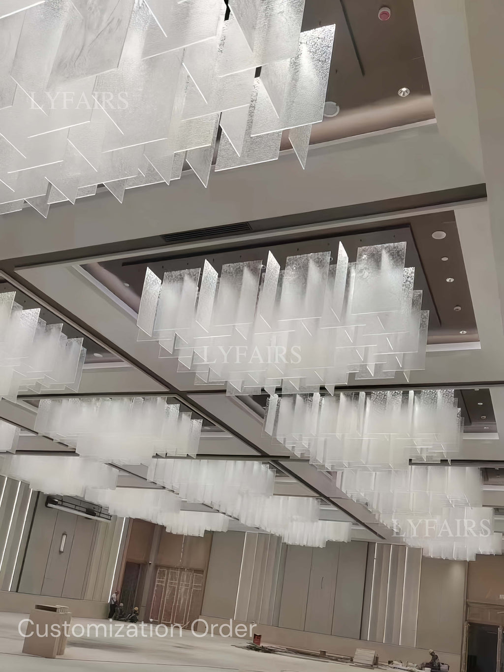 https://cdn.shopify.com/s/files/1/0554/8562/8591/files/Modern_Layered_Clear_Textured_Glass_Panel_Ceiling_Light_for_Hotel_Lobby.jpg?v=1774927063