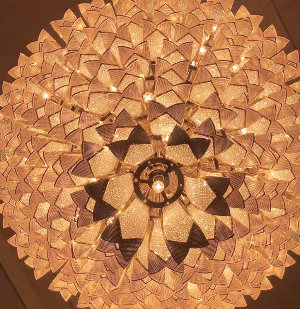 https://cdn.shopify.com/s/files/1/0736/8795/7790/files/extra-large-luxury-multi-tier-gold-crystalchandelier-for-stairslarge-high-ceiling-room-merlin-lamps-10.png?v=1765406248