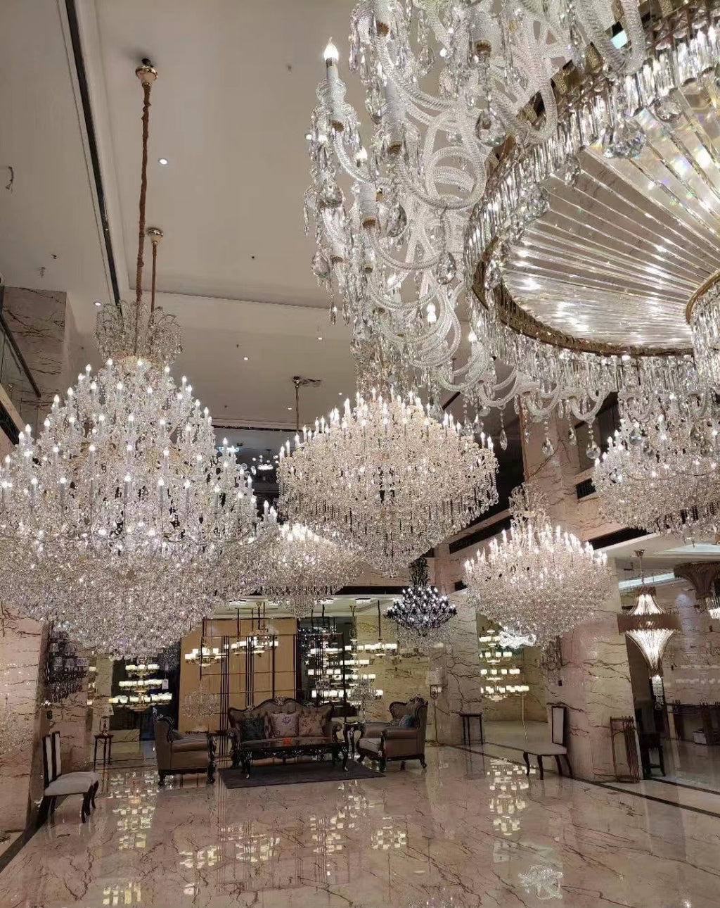 https://cdn.shopify.com/s/files/1/0778/2046/1351/files/extra-large-multi-tiered-candle-light-crystal-chandelier-for-hotelrestaurant-merlin-lamps-12.jpg?v=1765781477