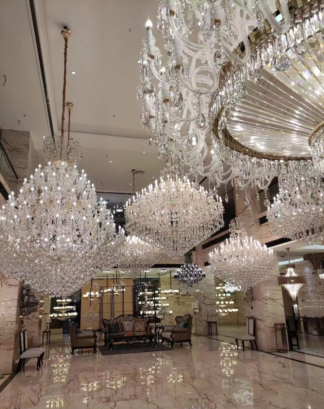 https://cdn.shopify.com/s/files/1/0778/2046/1351/files/extra-large-multi-tiered-candle-light-crystal-chandelier-for-hotelrestaurant-merlin-lamps-12.jpg?v=1765781477