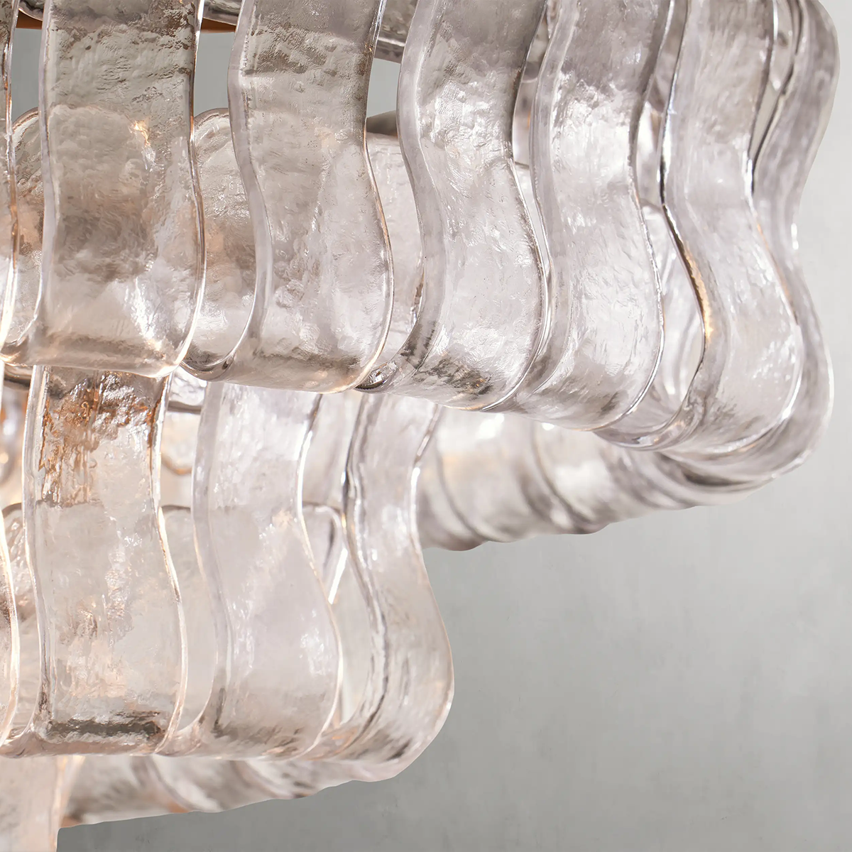 https://cdn.shopify.com/s/files/1/0736/8795/7790/files/ghiaccio-glass-oval-chandelier-5465-merlin-lamps-4.png?v=1765380218