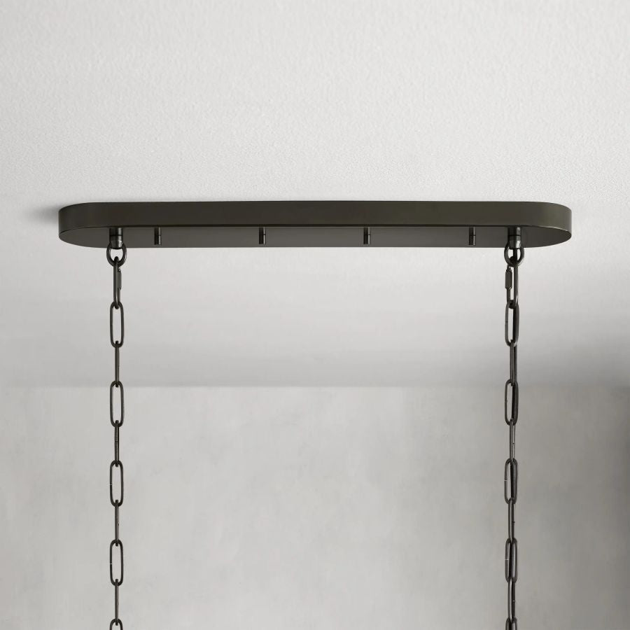 https://cdn.shopify.com/s/files/1/0736/8795/7790/files/ghiaccio-glass-oval-chandelier-5465-merlin-lamps-6.jpg?v=1765380222