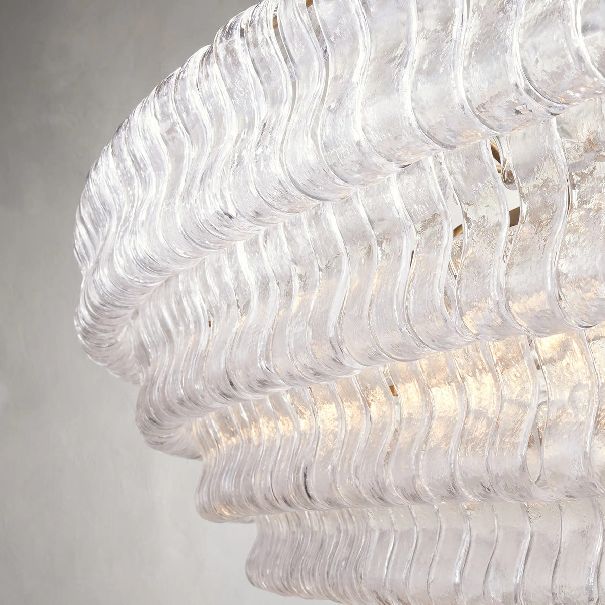 https://cdn.shopify.com/s/files/1/0736/8795/7790/files/ghiaccio-glass-oval-chandelier-5465-merlin-lamps-7.png?v=1765380225