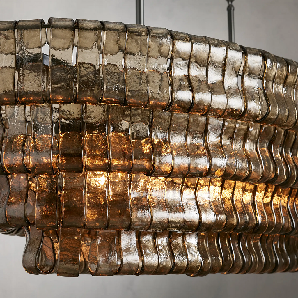 https://cdn.shopify.com/s/files/1/0736/8795/7790/files/ghiaccio-glass-oval-chandelier-5465-merlin-lamps-8.png?v=1765380227