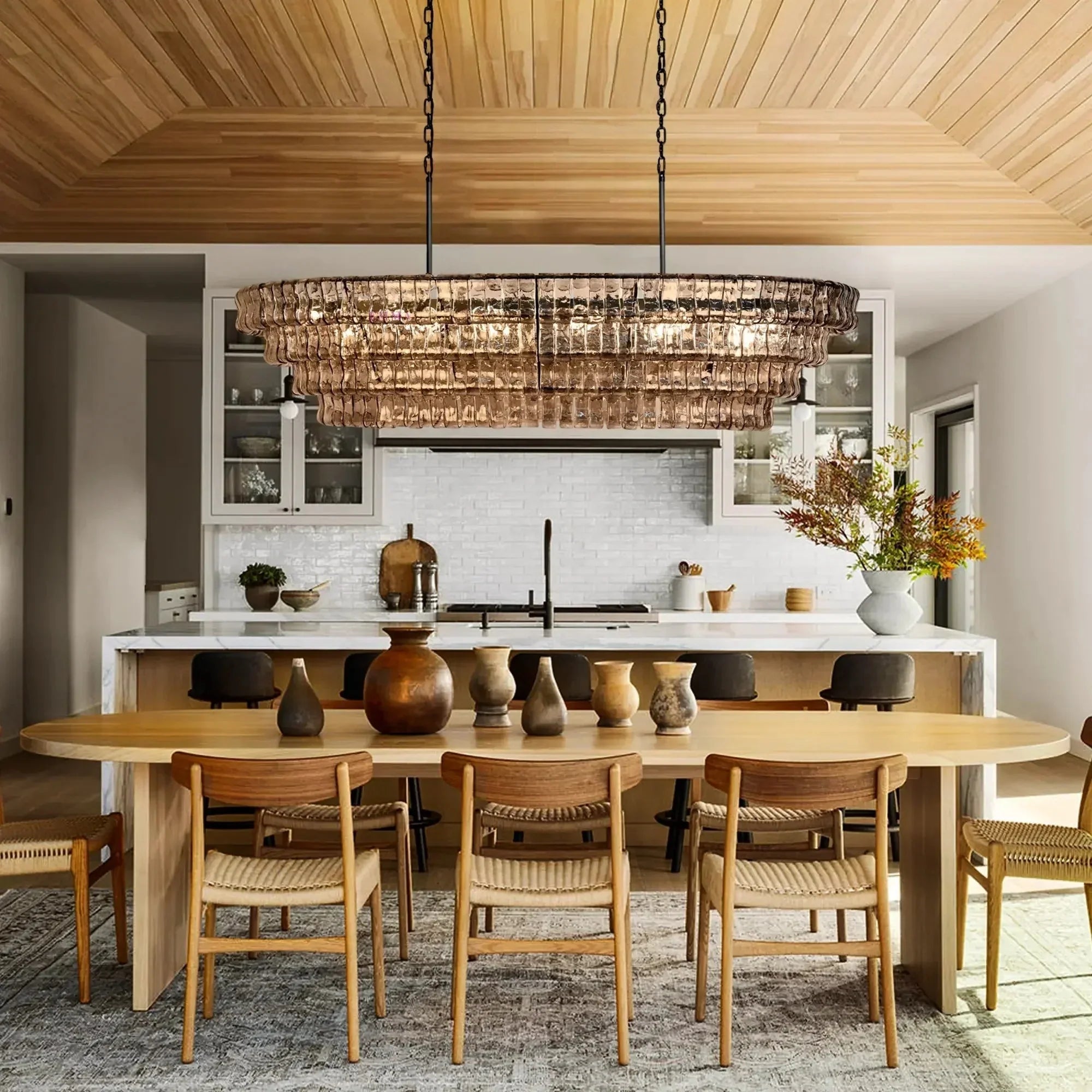 https://cdn.shopify.com/s/files/1/0736/8795/7790/files/ghiaccio-glass-oval-chandelier-5465-merlin-lamps.webp?v=1765380211