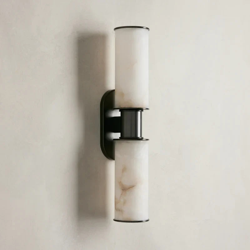 https://cdn.shopify.com/s/files/1/0736/8795/7790/files/harlin-2-light-wall-sconce-in-alabaster-merlin-lamps-2.webp?v=1765382503