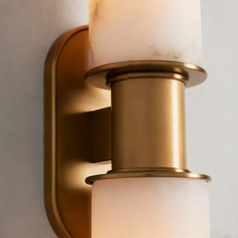 https://cdn.shopify.com/s/files/1/0736/8795/7790/files/harlin-2-light-wall-sconce-in-alabaster-merlin-lamps-4.webp?v=1765382506
