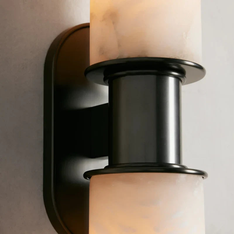https://cdn.shopify.com/s/files/1/0736/8795/7790/files/harlin-2-light-wall-sconce-in-alabaster-merlin-lamps-9.webp?v=1765382515