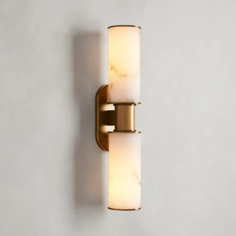 https://cdn.shopify.com/s/files/1/0736/8795/7790/files/harlin-2-light-wall-sconce-in-alabaster-merlin-lamps.webp?v=1765382502