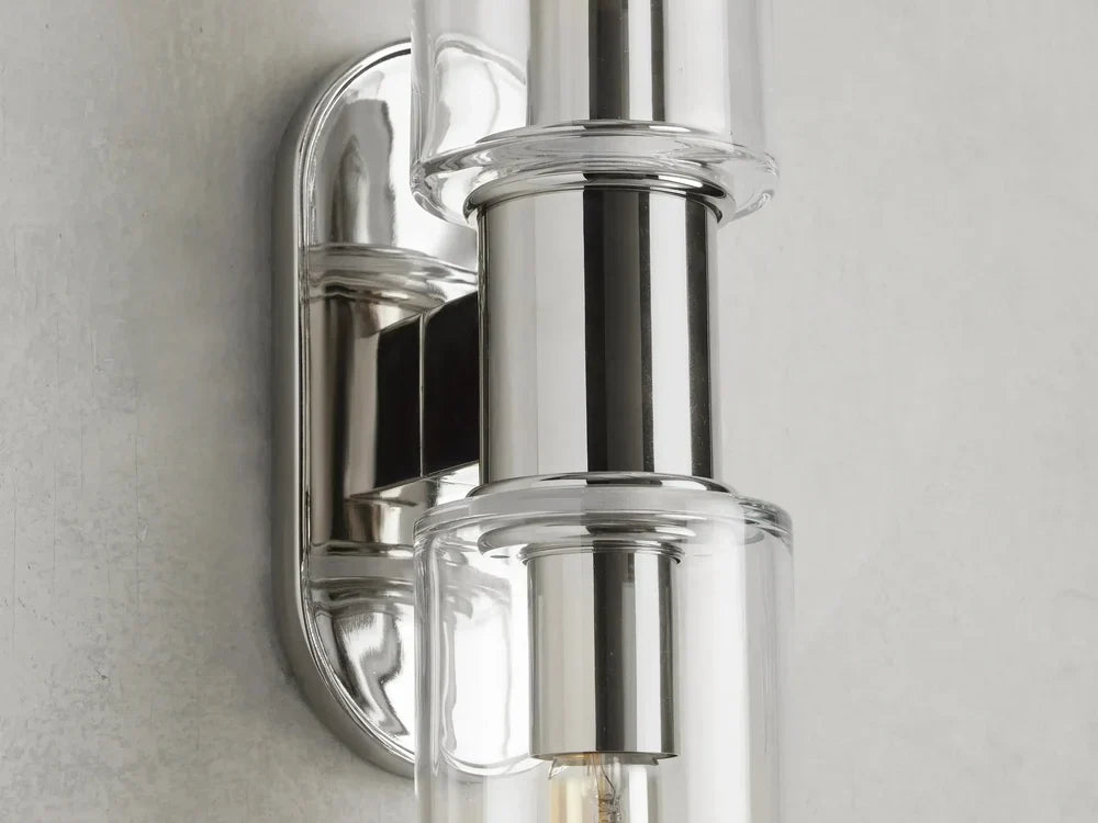https://cdn.shopify.com/s/files/1/0736/8795/7790/files/harlin-2-light-wall-sconce-in-clear-merlin-lamps-11.webp?v=1765408727