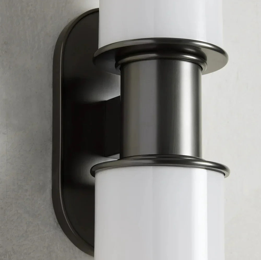 https://cdn.shopify.com/s/files/1/0736/8795/7790/files/harlin-modern-milk-glass-2-light-wall-sconce-merlin-lamps-10.webp?v=1765408754