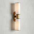 https://cdn.shopify.com/s/files/1/0736/8795/7790/files/harlin-modern-milk-glass-2-light-wall-sconce-merlin-lamps.webp?v=1765408739