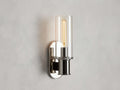 https://cdn.shopify.com/s/files/1/0736/8795/7790/files/harlin-wall-sconce-in-clear-merlin-lamps.jpg?v=1765382025