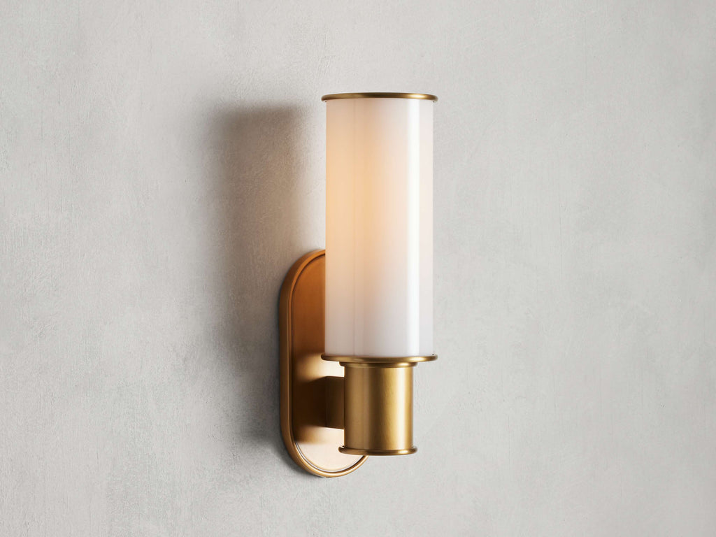 https://cdn.shopify.com/s/files/1/0736/8795/7790/files/harlin-wall-sconce-in-milk-merlin-lamps.jpg?v=1765382290
