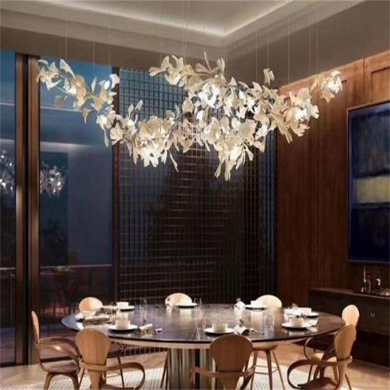 https://cdn.shopify.com/s/files/1/0736/8795/7790/products/keyah-porcelain-ginkgo-ceramics-chandelier-modern-luxury-lights-merlin-lamps-2.jpg?v=1765357509