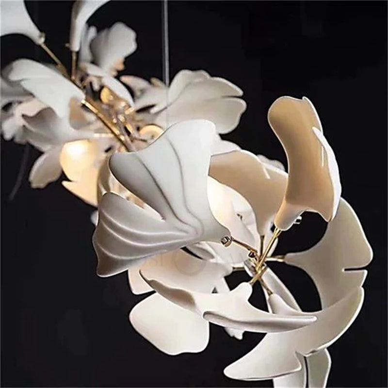 https://cdn.shopify.com/s/files/1/0736/8795/7790/products/keyah-porcelain-ginkgo-ceramics-chandelier-modern-luxury-lights-merlin-lamps-6.jpg?v=1765357515