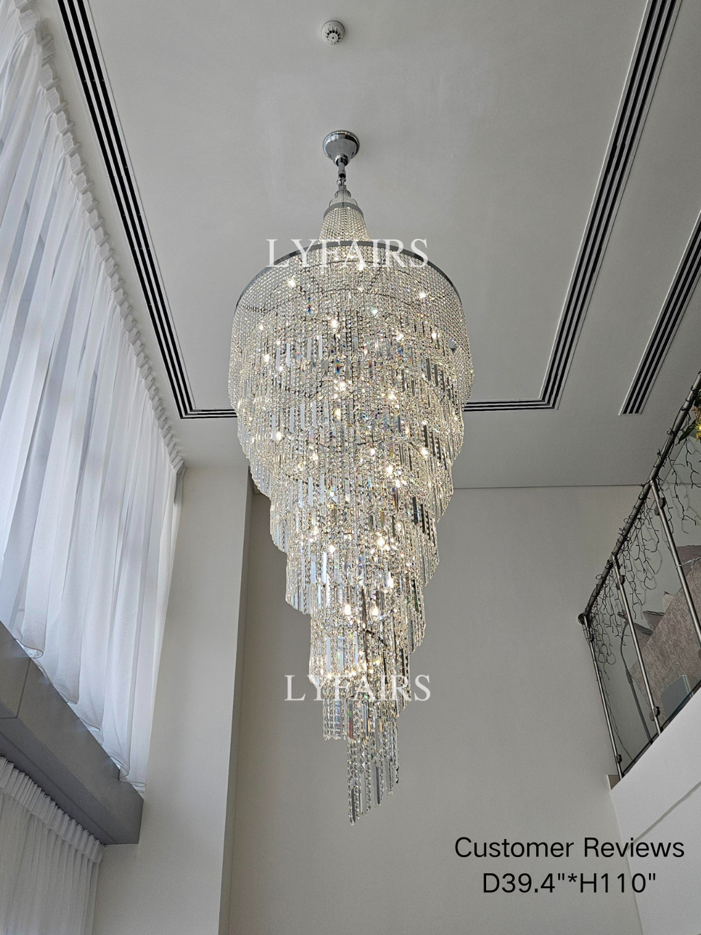 https://cdn.shopify.com/s/files/1/0554/8562/8591/files/lyfairs-ModernCrystalTasselChandelierforFoyerStaircase.png?v=1767603858