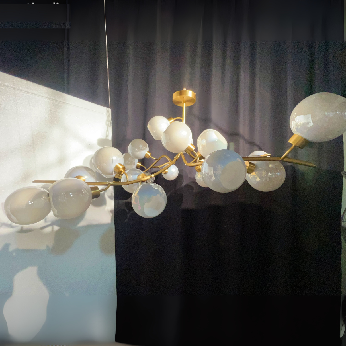 https://cdn.shopify.com/s/files/1/0554/8562/8591/files/lyfairsModernHand-blownGlassGlobesBranchChandelierforLivingDiningRoomKitchenIsland.png?v=1773475187