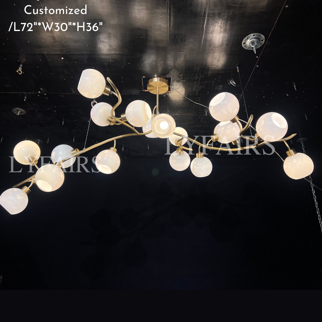 https://cdn.shopify.com/s/files/1/0554/8562/8591/files/lyfairsModernHand-blownGlassGlobesBranchChandelierforLivingDiningRoomKitchenIsland_1.png?v=1773475187