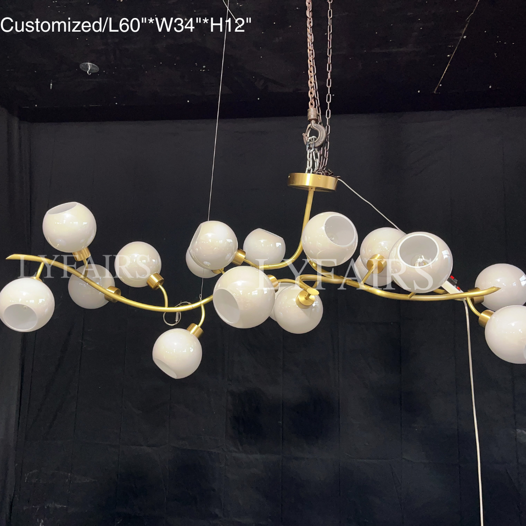 https://cdn.shopify.com/s/files/1/0554/8562/8591/files/lyfairsModernHand-blownGlassGlobesBranchChandelierforLivingDiningRoomKitchenIsland_8.png?v=1773475187