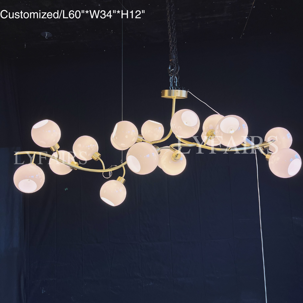 https://cdn.shopify.com/s/files/1/0554/8562/8591/files/lyfairsModernHand-blownGlassGlobesBranchChandelierforLivingDiningRoomKitchenIsland_9.png?v=1773475187