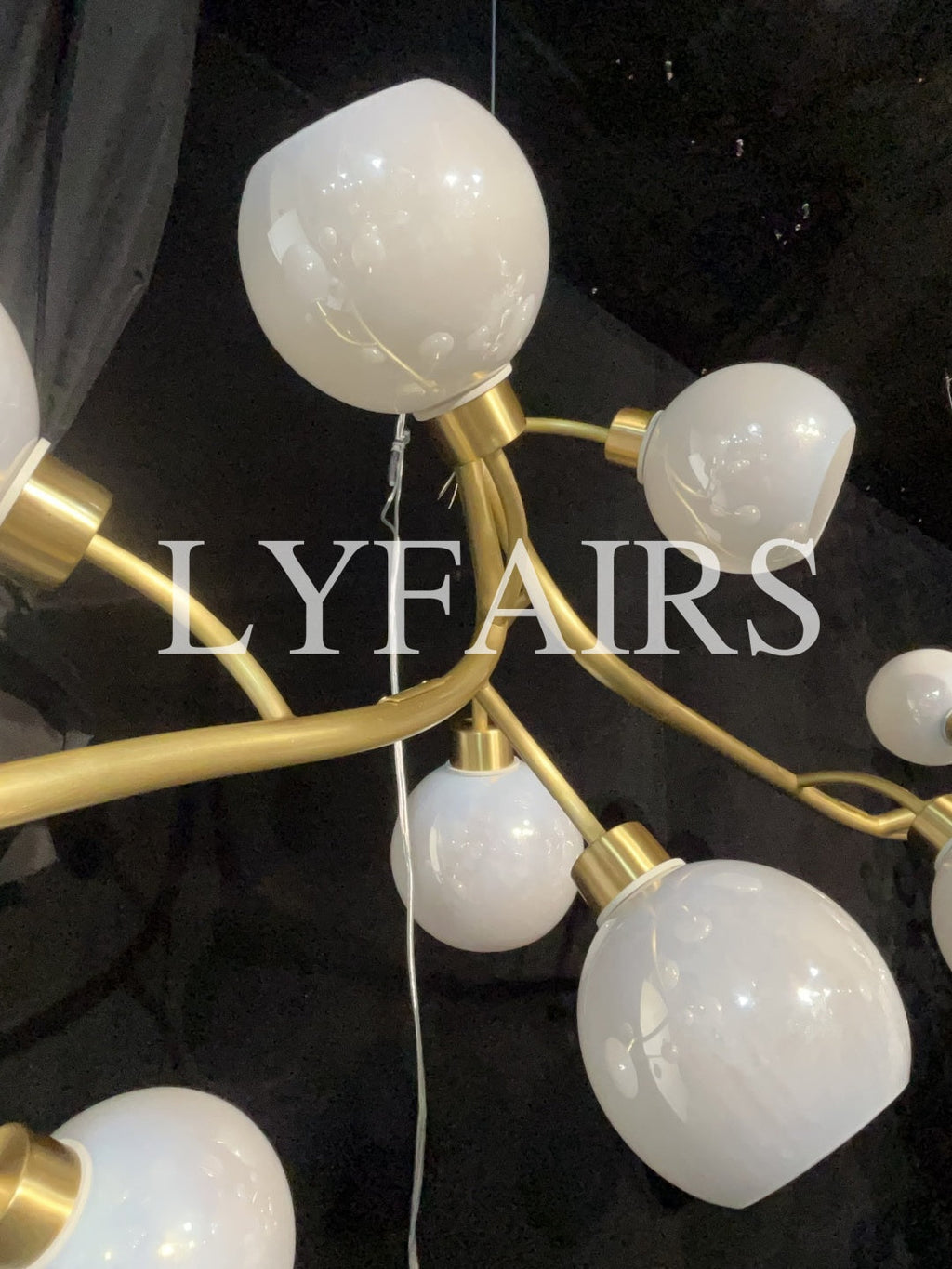 https://cdn.shopify.com/s/files/1/0554/8562/8591/files/lyfairsModernHandblownGlassGlobesBranchChandelier.jpg?v=1773475187