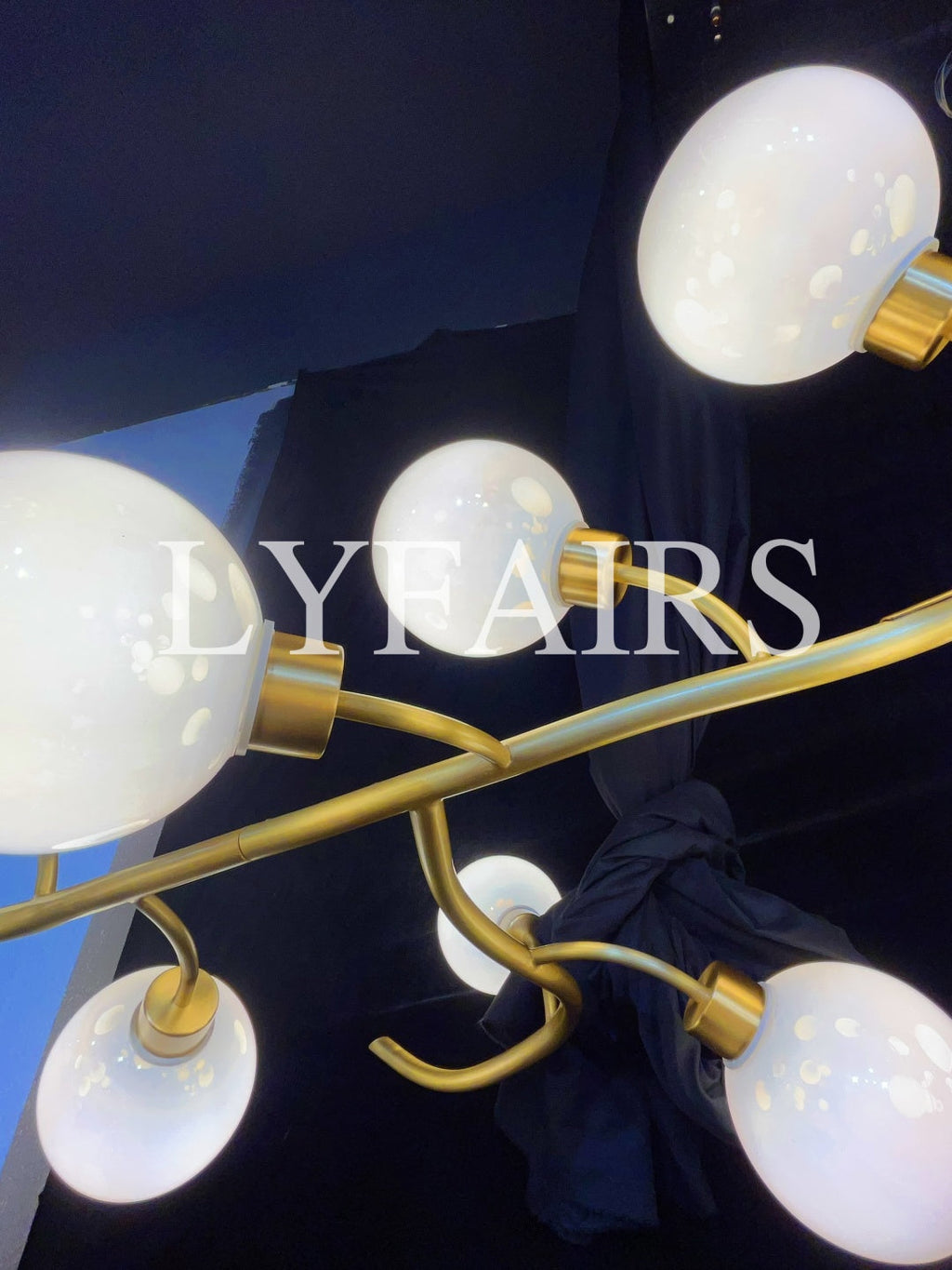 https://cdn.shopify.com/s/files/1/0554/8562/8591/files/lyfairsModernHandblownGlassGlobesBranchChandelier_4.jpg?v=1773475187