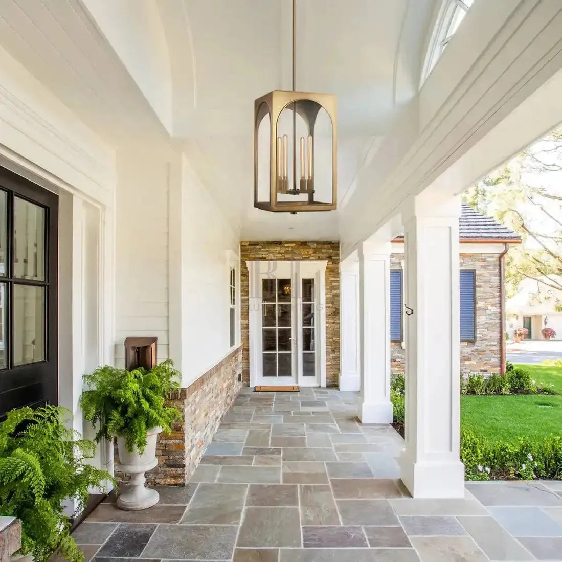 https://cdn.shopify.com/s/files/1/0736/8795/7790/files/palladian-outdoor-pendant-brass-or-bronze-28-inch-wall-sconce-merlin-lamps-2.webp?v=1765415223