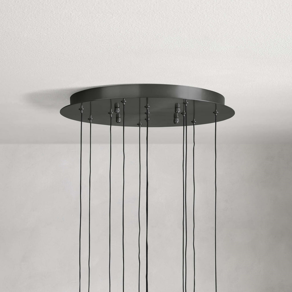 https://cdn.shopify.com/s/files/1/0736/8795/7790/files/solitaire-modern-17-24-36-58-round-chandelier-lighting-merlin-lamps-16.jpg?v=1765374454