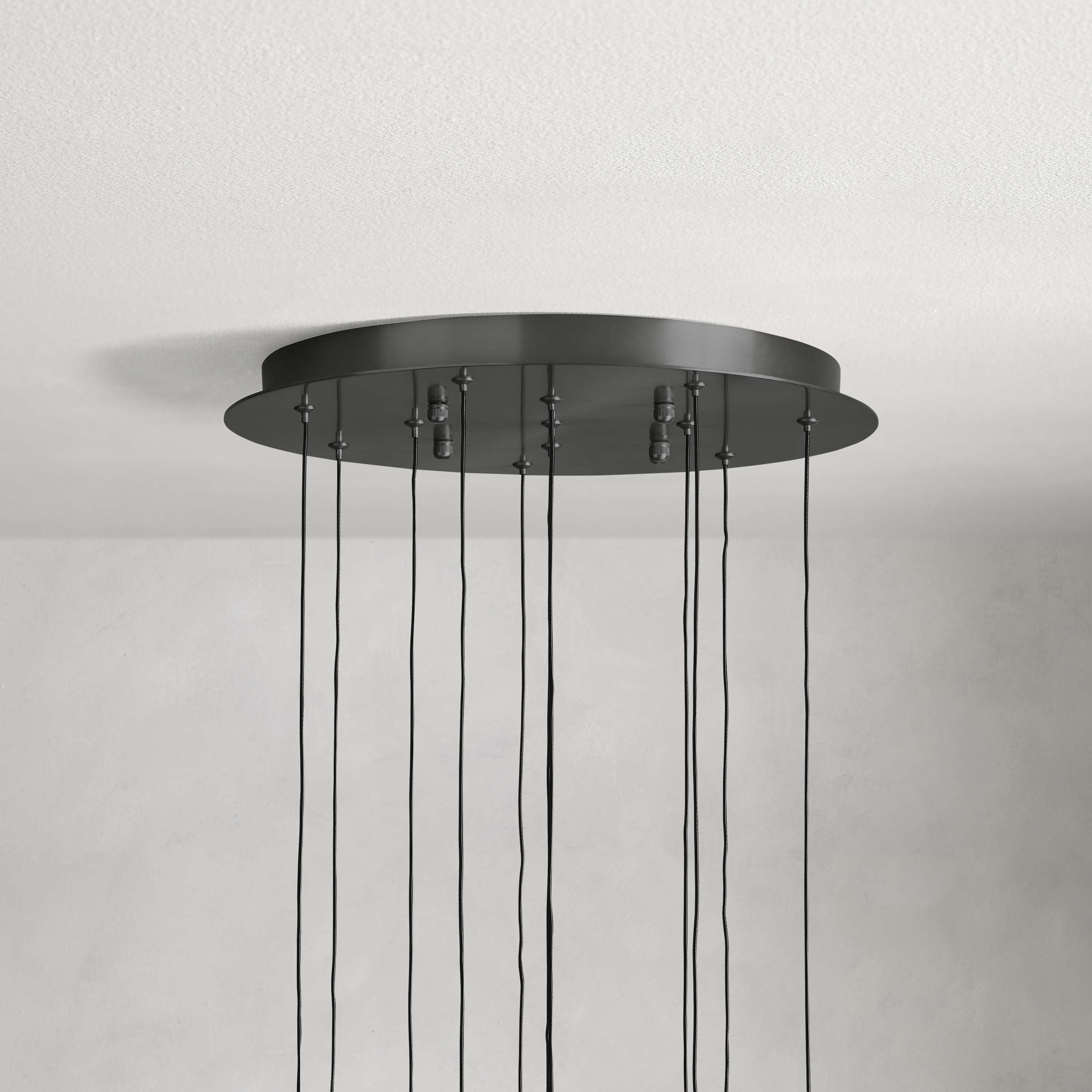 https://cdn.shopify.com/s/files/1/0736/8795/7790/files/solitaire-modern-17-24-36-58-round-chandelier-lighting-merlin-lamps-16.jpg?v=1765374454