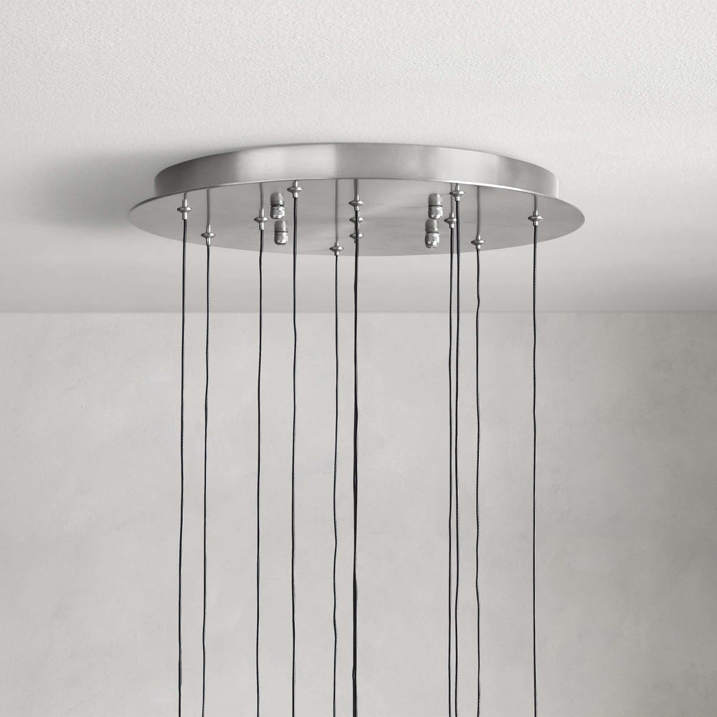 https://cdn.shopify.com/s/files/1/0736/8795/7790/files/solitaire-modern-17-24-36-58-round-chandelier-lighting-merlin-lamps-17.jpg?v=1765374456