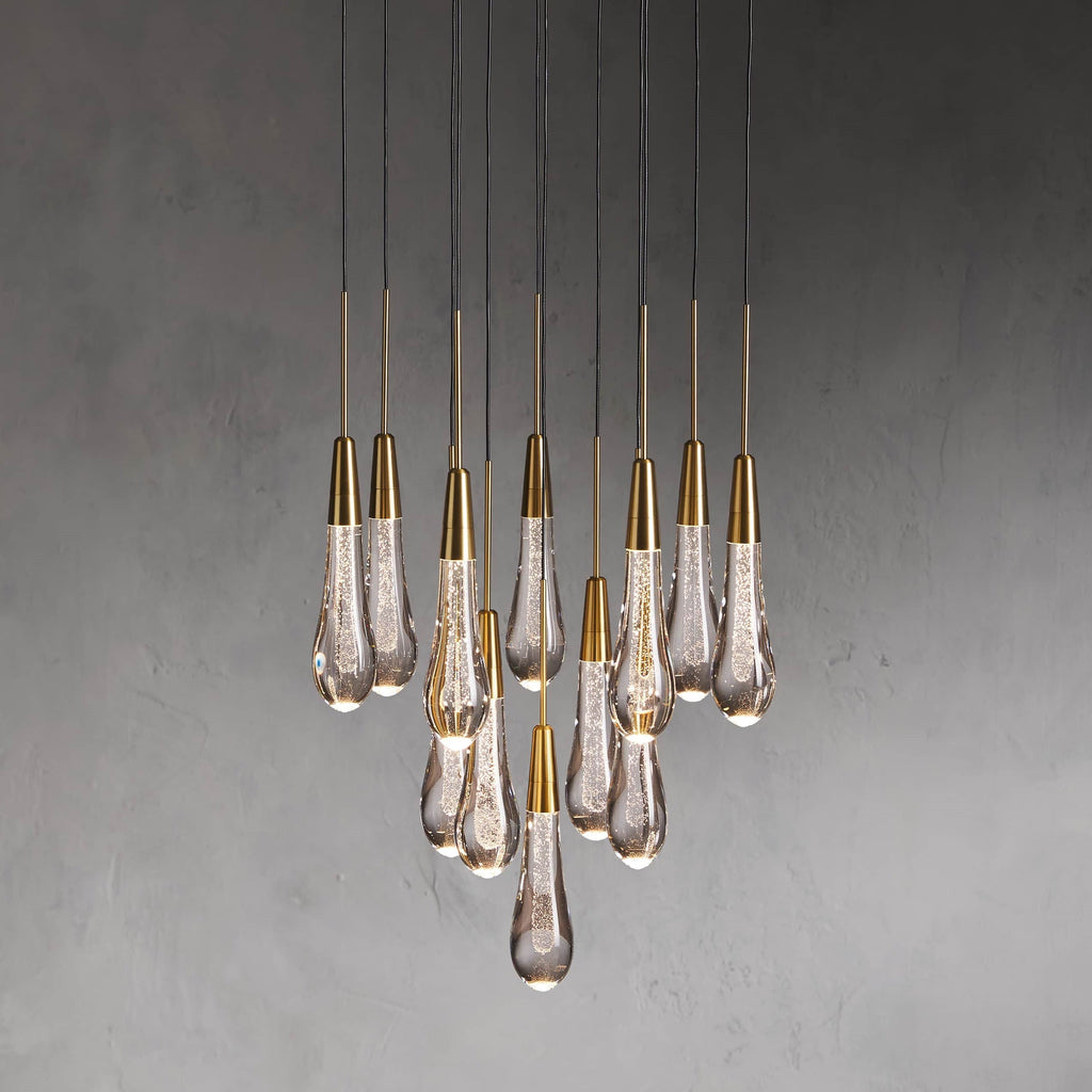 https://cdn.shopify.com/s/files/1/0736/8795/7790/files/solitaire-modern-17-24-36-58-round-chandelier-lighting-merlin-lamps-2.jpg?v=1765374428