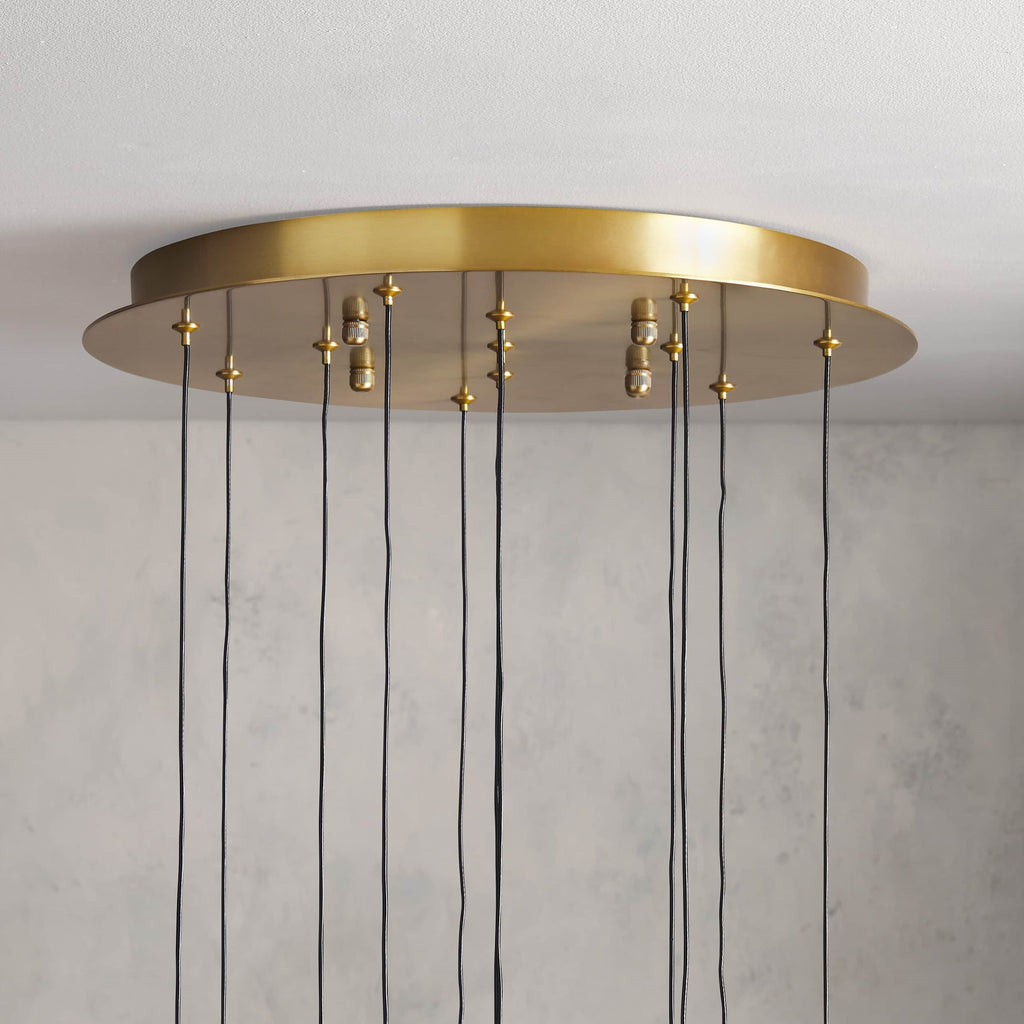 https://cdn.shopify.com/s/files/1/0736/8795/7790/files/solitaire-modern-17-24-36-58-round-chandelier-lighting-merlin-lamps-22.jpg?v=1765374464