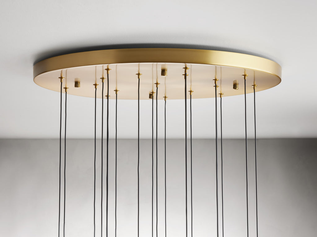 https://cdn.shopify.com/s/files/1/0736/8795/7790/files/solitaire-modern-17-24-36-58-round-chandelier-lighting-merlin-lamps-23.jpg?v=1765374466