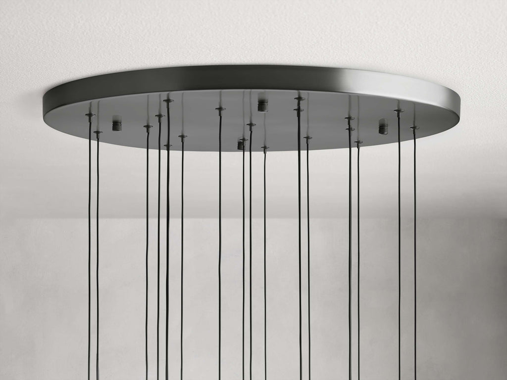 https://cdn.shopify.com/s/files/1/0736/8795/7790/files/solitaire-modern-17-24-36-58-round-chandelier-lighting-merlin-lamps-24.jpg?v=1765374468