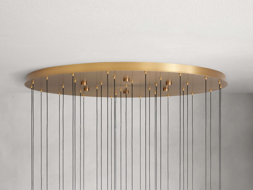 https://cdn.shopify.com/s/files/1/0736/8795/7790/files/solitaire-modern-17-24-36-58-round-chandelier-lighting-merlin-lamps-26.jpg?v=1765374472