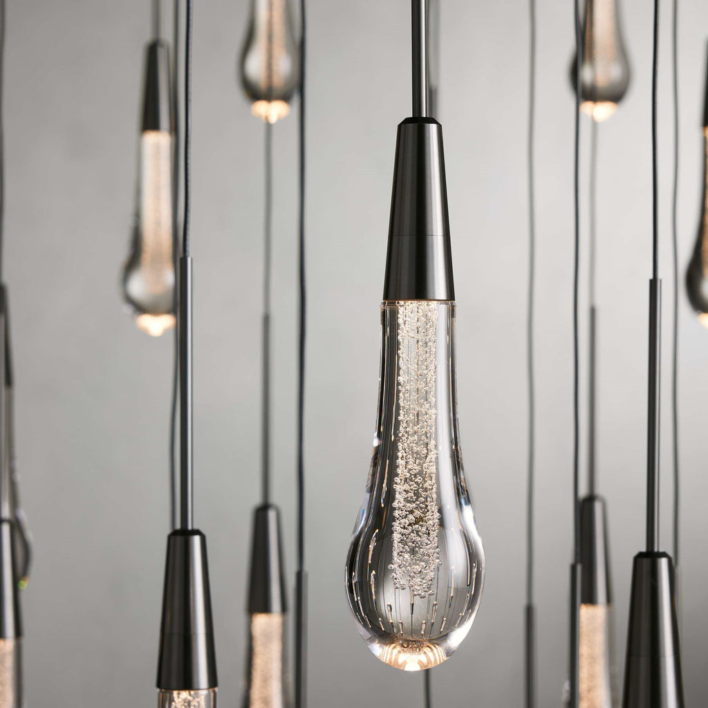 https://cdn.shopify.com/s/files/1/0736/8795/7790/files/solitaire-modern-17-24-36-58-round-chandelier-lighting-merlin-lamps-31.jpg?v=1765374483