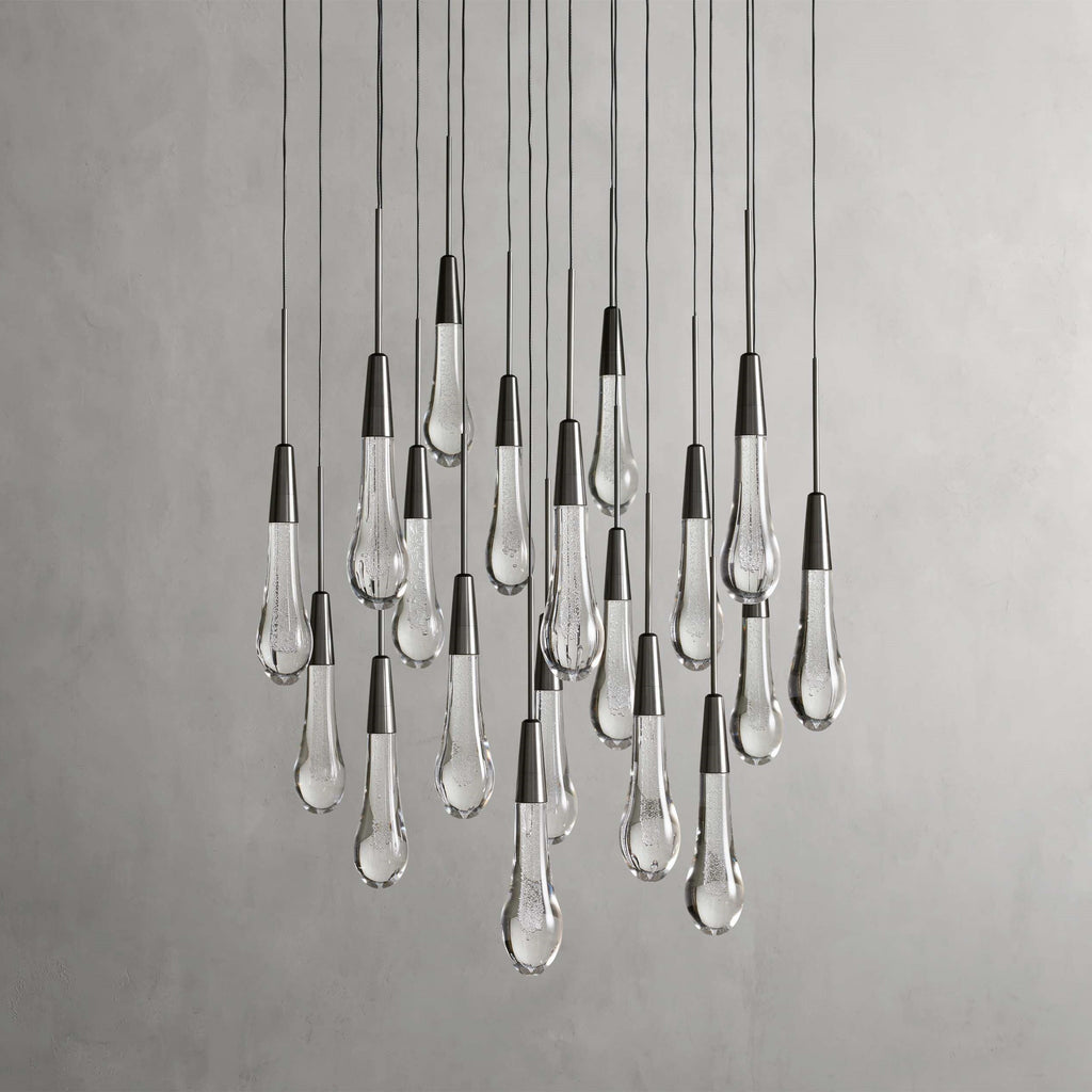 https://cdn.shopify.com/s/files/1/0736/8795/7790/files/solitaire-modern-17-24-36-58-round-chandelier-lighting-merlin-lamps-34.jpg?v=1765374490