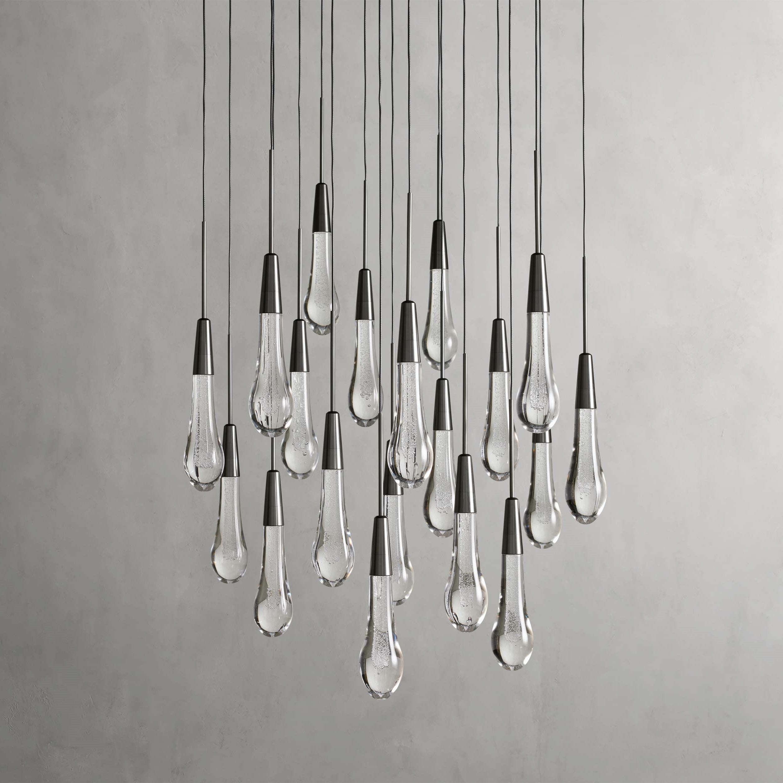 https://cdn.shopify.com/s/files/1/0736/8795/7790/files/solitaire-modern-17-24-36-58-round-chandelier-lighting-merlin-lamps-34.jpg?v=1765374490