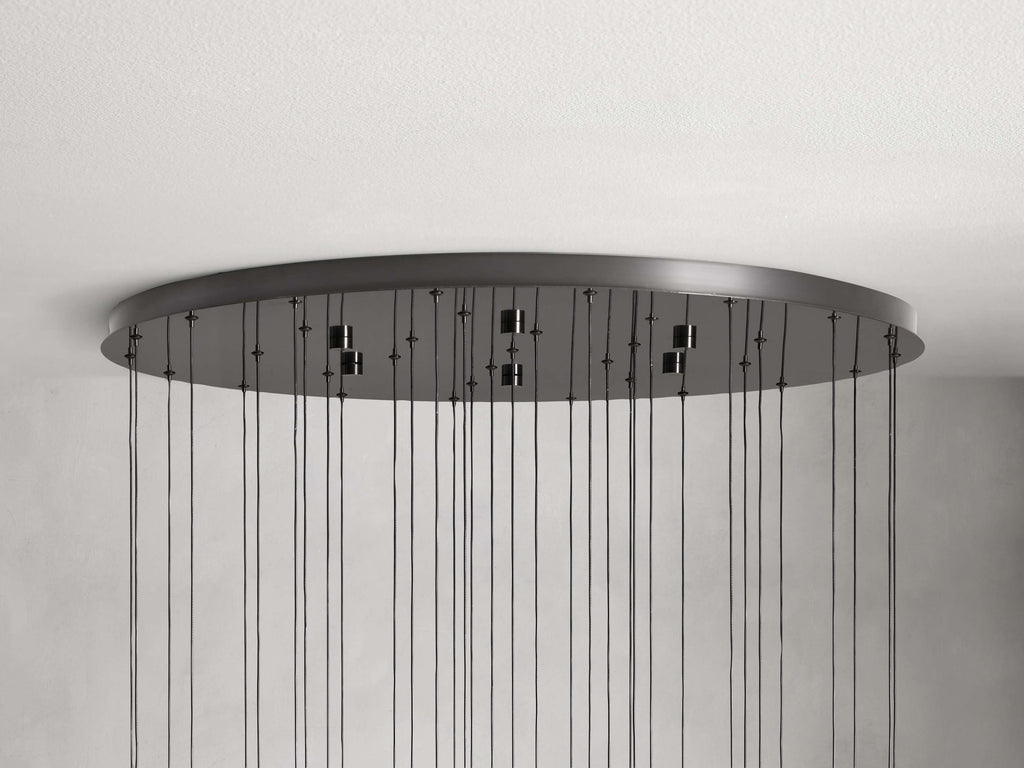 https://cdn.shopify.com/s/files/1/0736/8795/7790/files/solitaire-modern-17-24-36-58-round-chandelier-lighting-merlin-lamps-39.jpg?v=1765374501