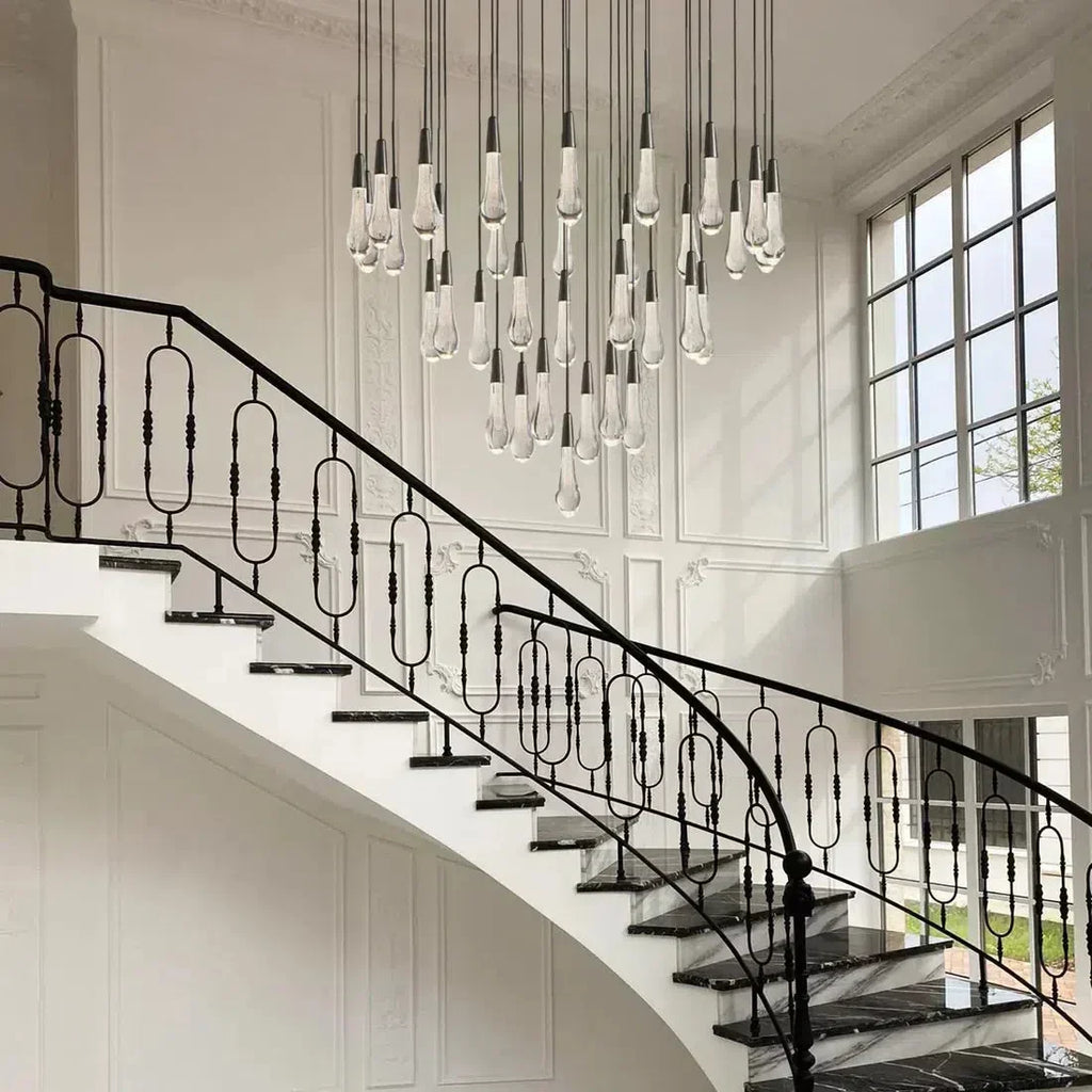 https://cdn.shopify.com/s/files/1/0736/8795/7790/files/solitaire-modern-17-24-36-58-round-chandelier-lighting-merlin-lamps.webp?v=1765374426